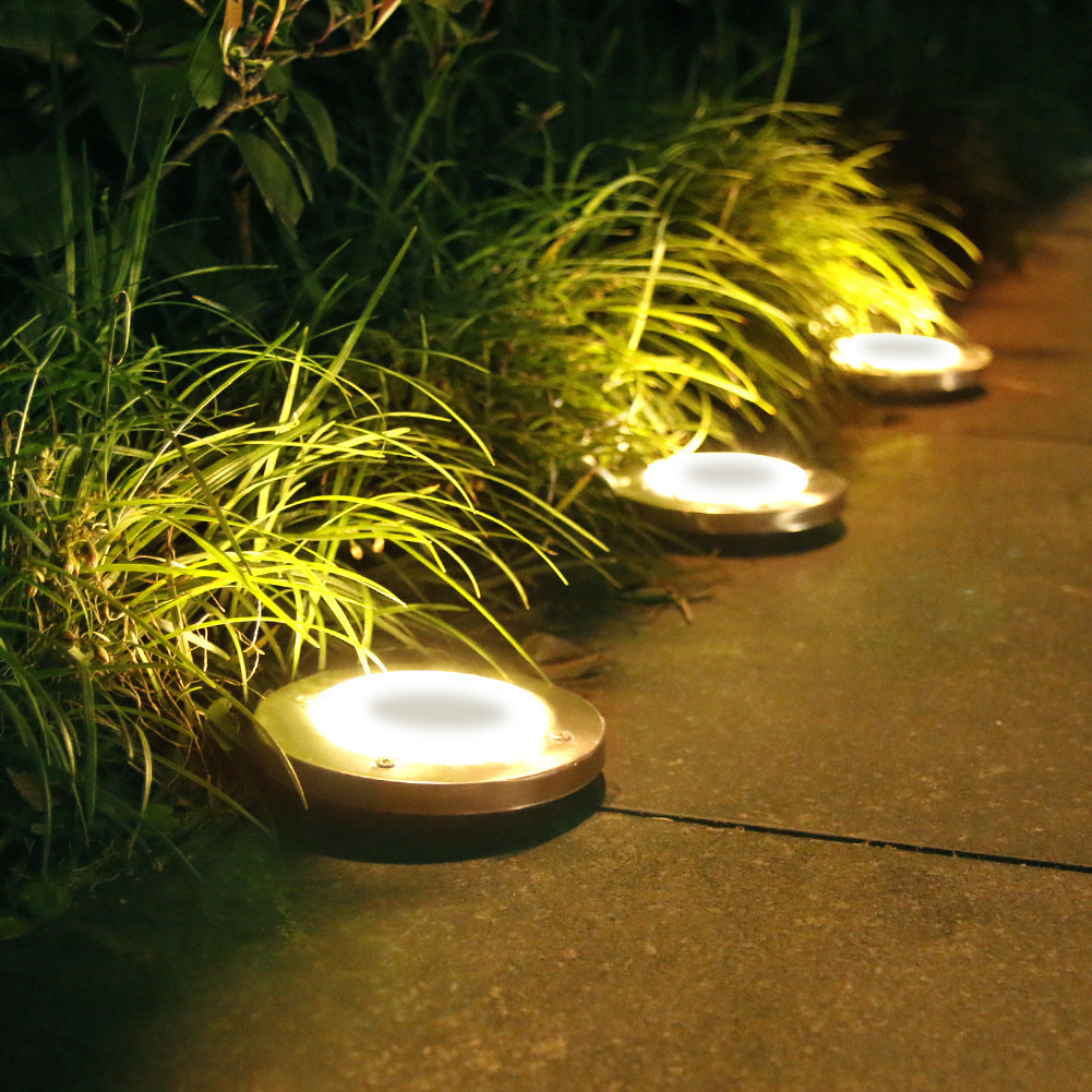 Outdoor solar powered lawn and garden ground lighting